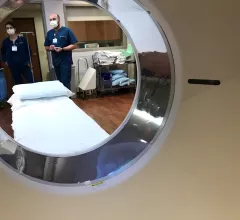 CT scanner Canon Aquilion One 320 slice system at Northwestern Medicine Central DuPage Hospital. Radiology technologists ready to prep a patient for a scan.