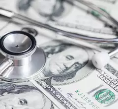 healthcare money economics dollar stethoscope acquire merger