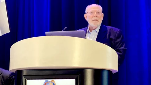 Roberto Lang speaking at ASE23 on AI industry partnerships.