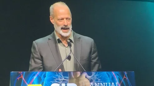 Sebastian Junger speaking at SIR 2025