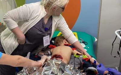 A 4-year-old boy with a severe shrapnel injury to his back gets initial triage with ultrasound imaging in the emergency room at the National Children's Specialized Hospital (Ohmatdyt) in Kyiv in early March 2022. He was returning home with his father when Russian soldiers fired missiles at one of the districts in Kyiv. A missile hit the yard of the house and the boy and his father received shrapnel wounds. The boy underwent CT scanning and the imaging was used to help guide surgery. #Ukrainewar #Ukraine