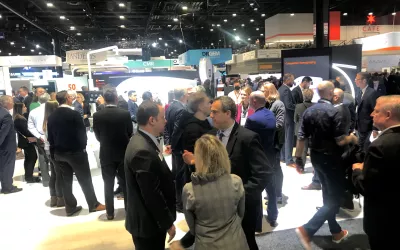 Large crowds were seen packed into the booths of the major vendors the first three days of the show. This is the Siemens booth on day 2.