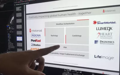 There has been a lot of consolidation and mergers of radiology vendors in the past several years, especially on the health IT side. This is an example from a booth presentation at Intelerad showing a list of the vendors the company has purchased to add additional functionality to its enterprise imaging platform, including large pieces for cardiology, remote viewing, workflow solutions and vendor neutral archive (VNA).